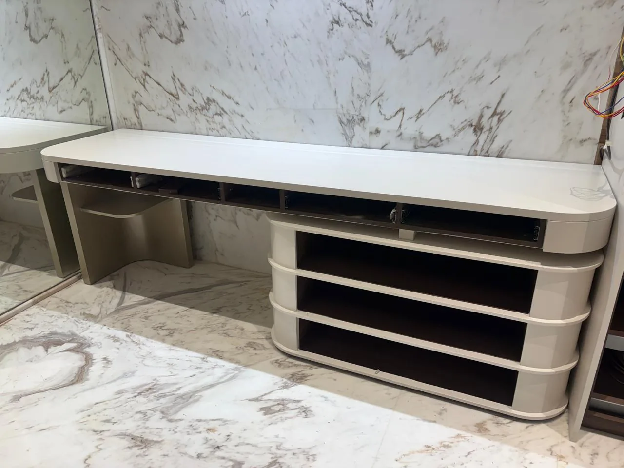 Curved made-to-measure console prepared by Jainam Furnitech
