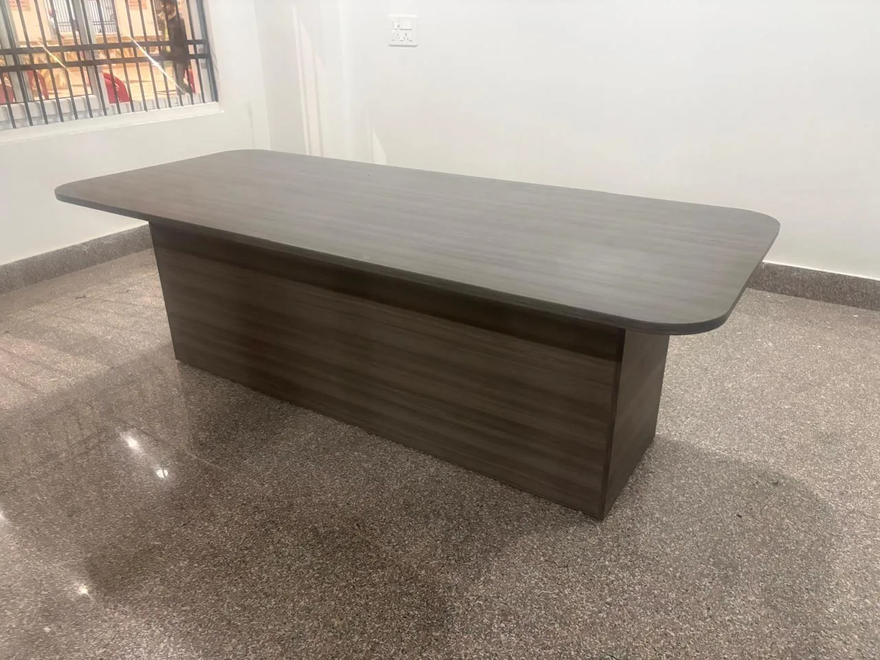 Custom conference table with rounded corners