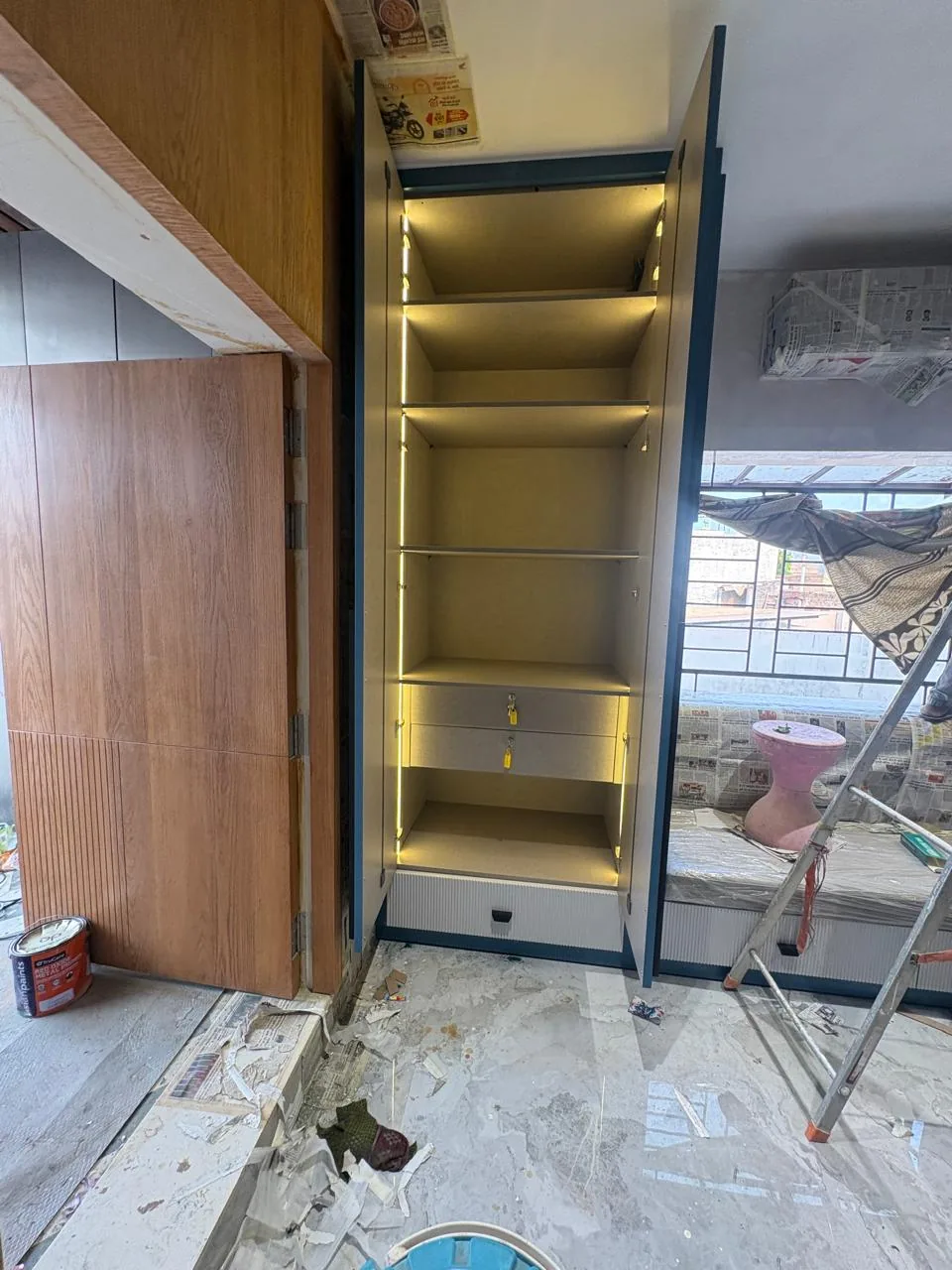 Illuminated cabinet being fitted at an active site