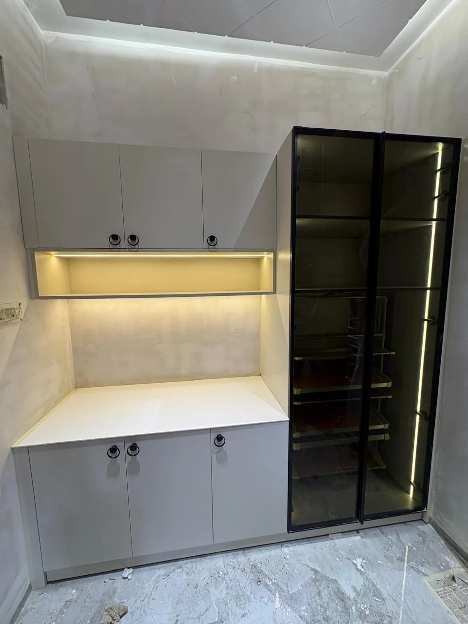 Compact utility cabinet with integrated task lighting