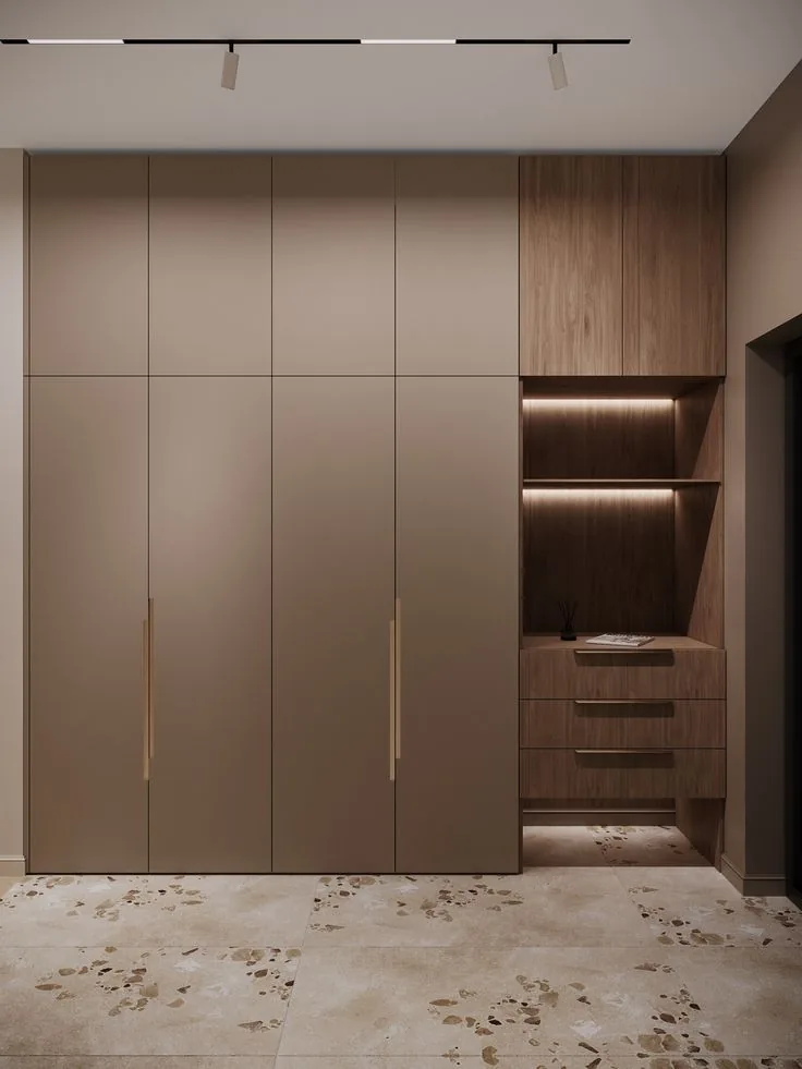 Completed taupe wardrobe with illuminated open shelving
